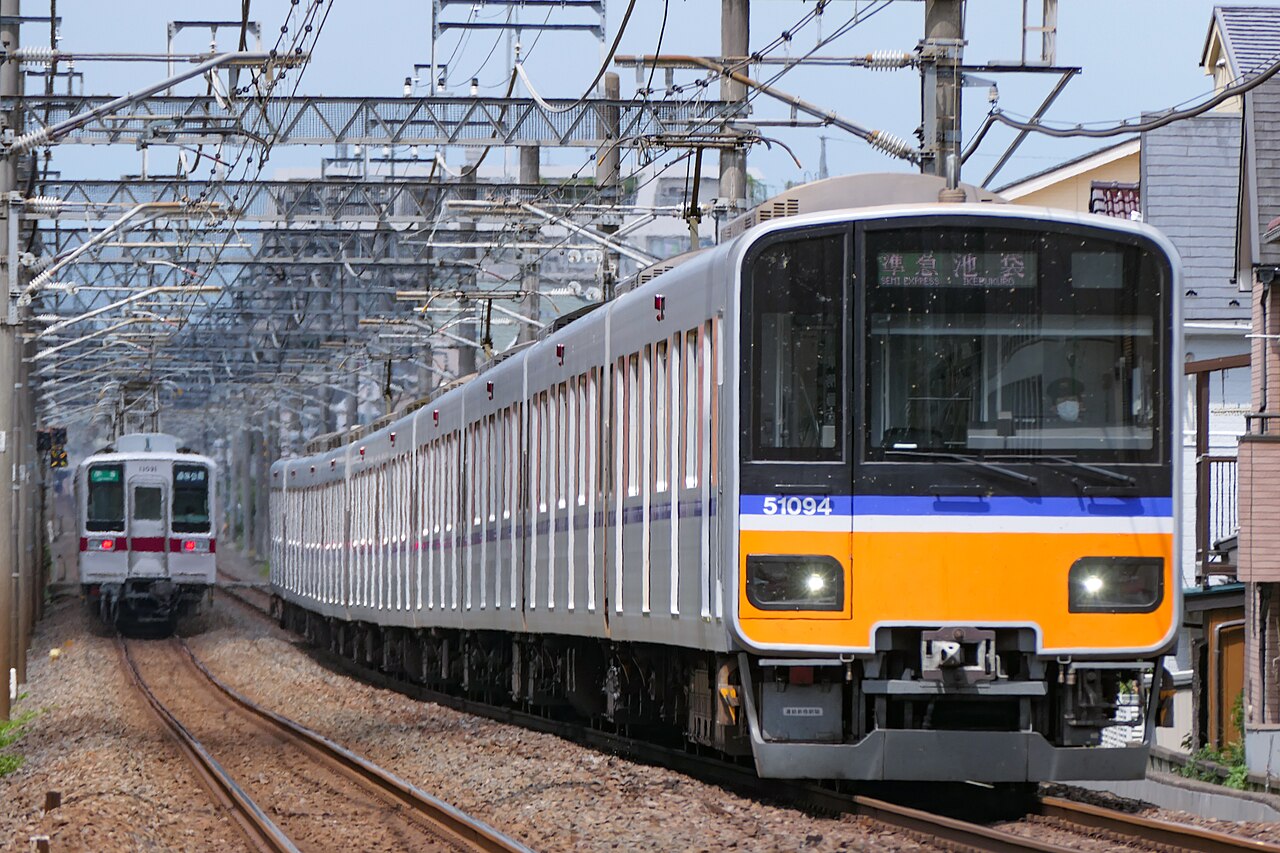 Tobu 50090 series and 10030 series trains on the Tobu Tojo Line.